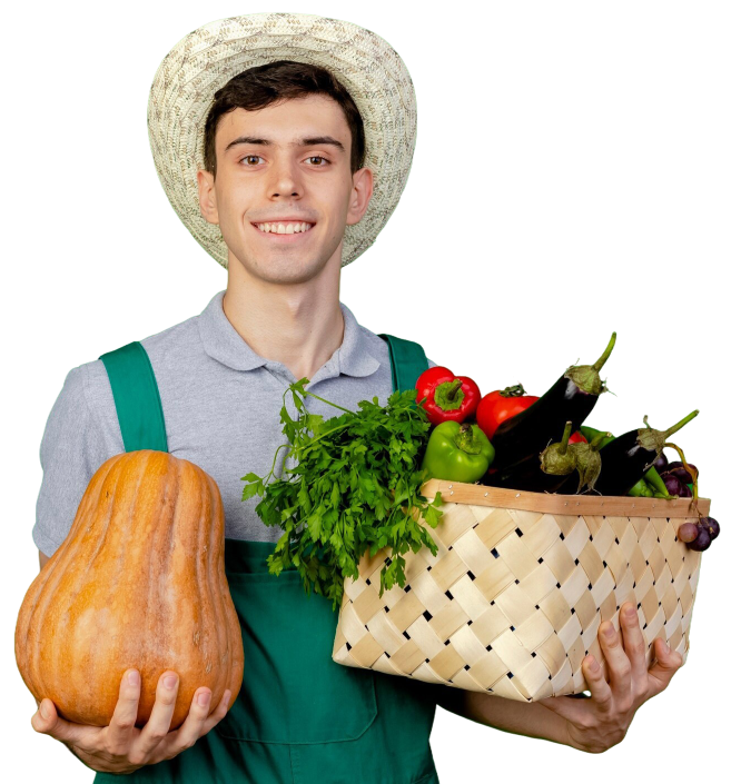 smiling young male gardener wearing gardening hat holds vegetable basket pumpkin
