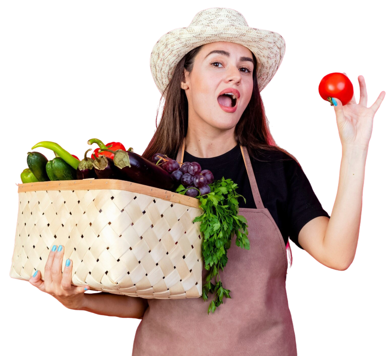 surprised beautiful gardener girl uniform wearing gardening hat holding vegetable basket with tomato isolated pink background